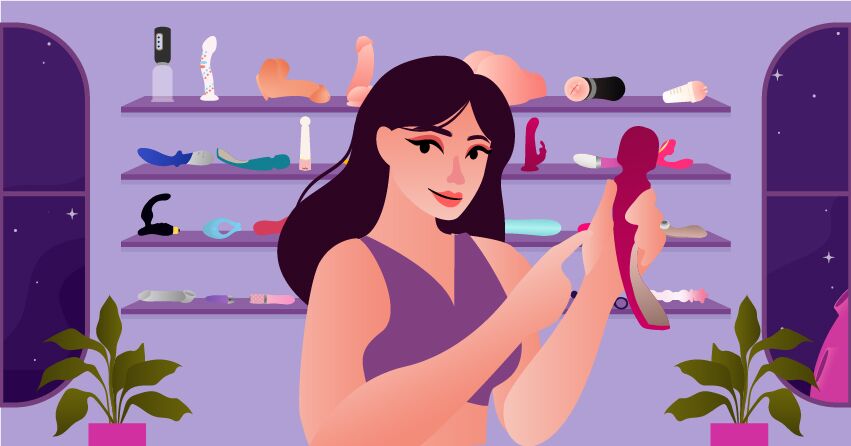 A woman holding a magic wand massager.